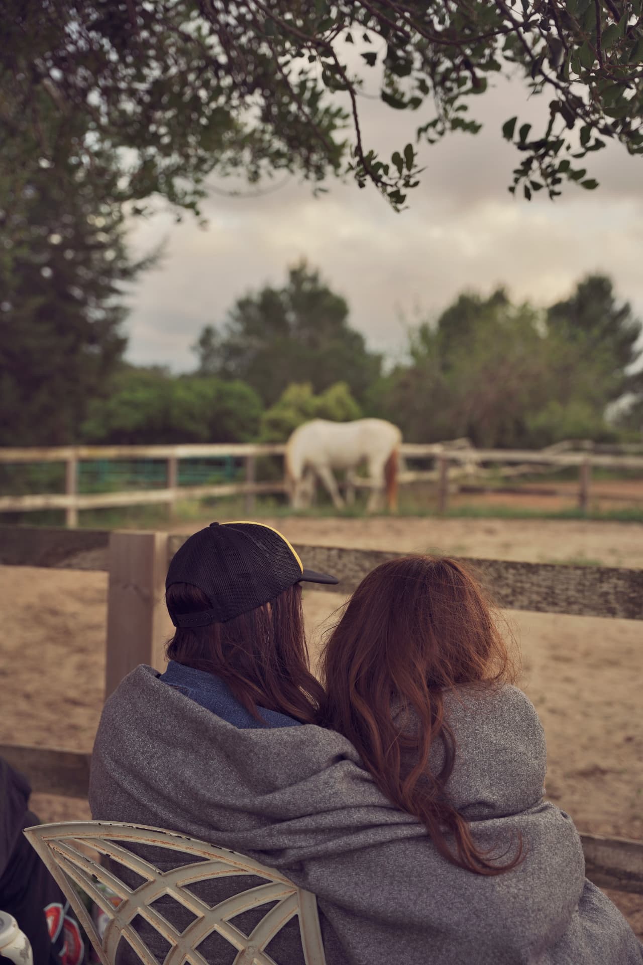 Witnessing from the shade — two participants watching a session unfold.